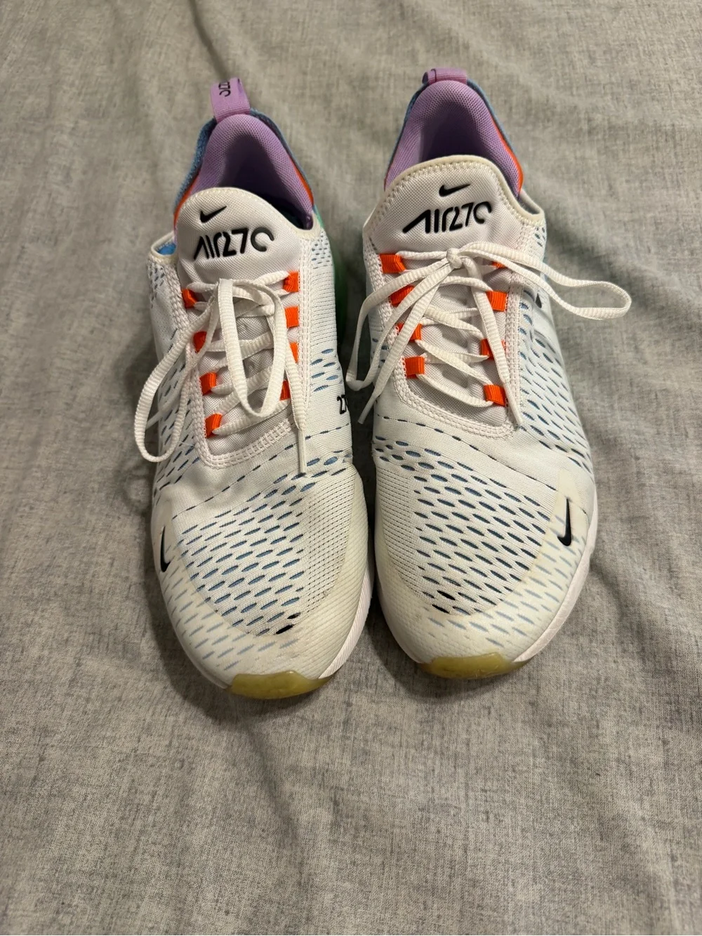 Nike White Running Sneakers with Orange Accents and Purple Lining